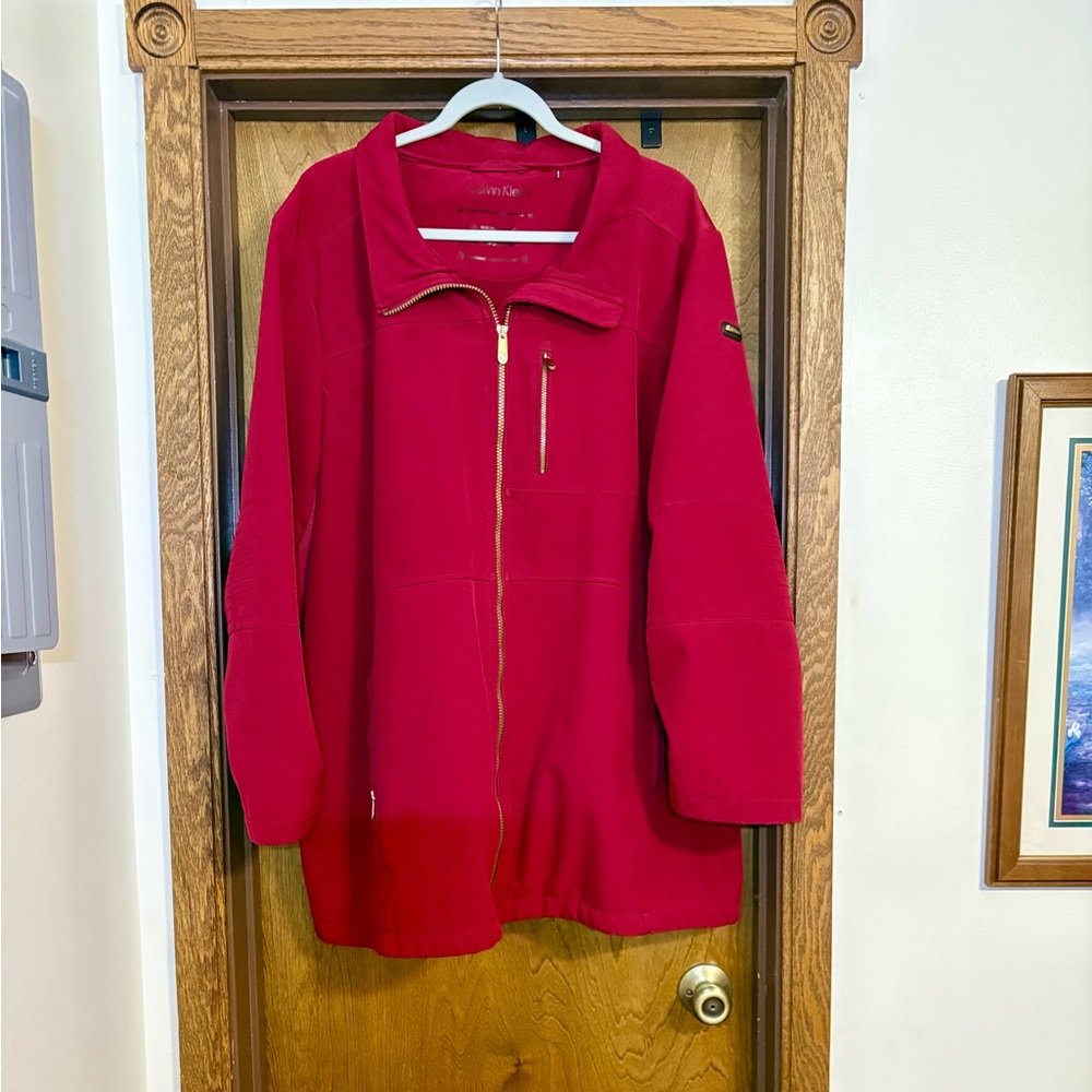 Calvin Klein Women's rust color zip coat.